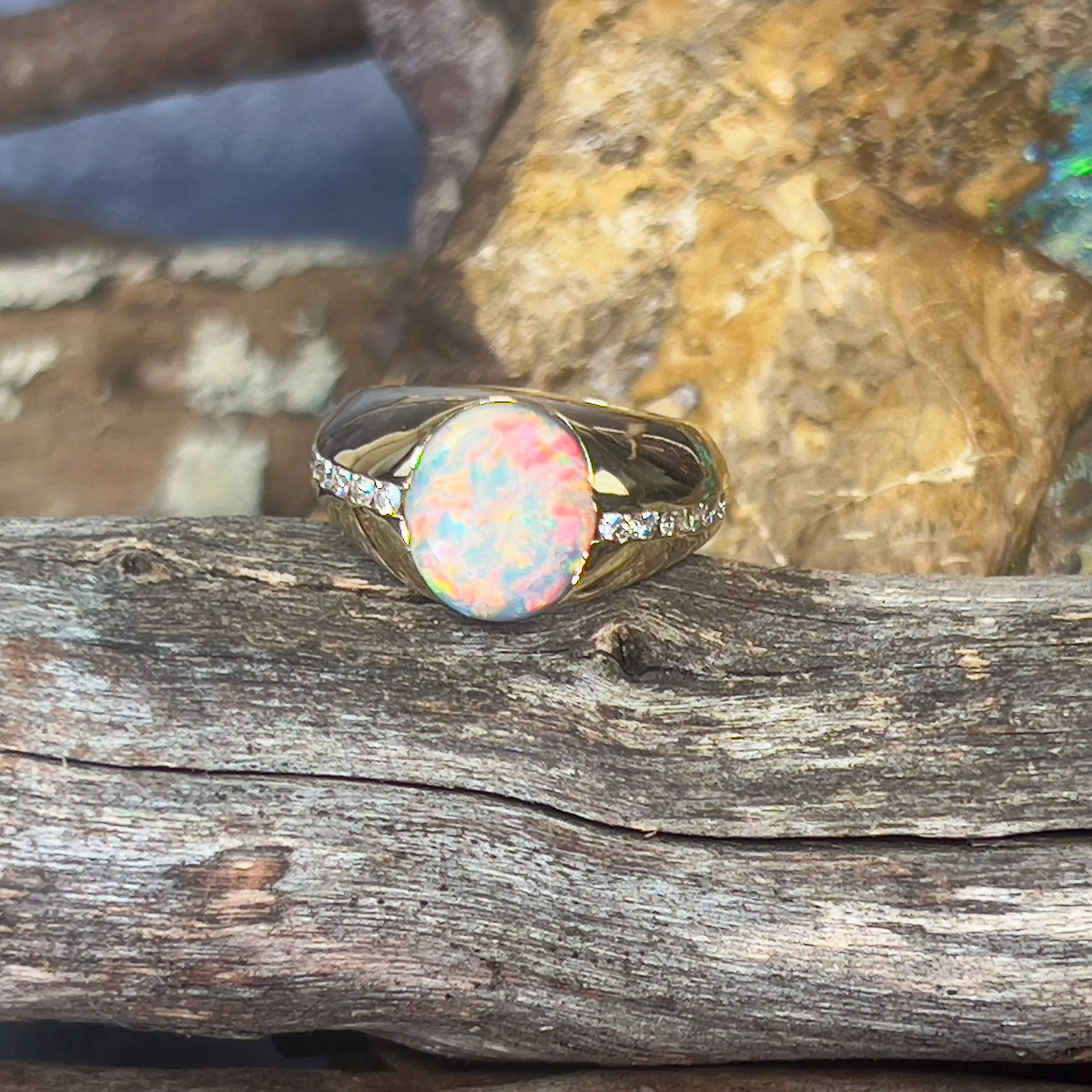 18kt Yellow Gold Black Opal 3.06ct signet style rub ring with diamonds