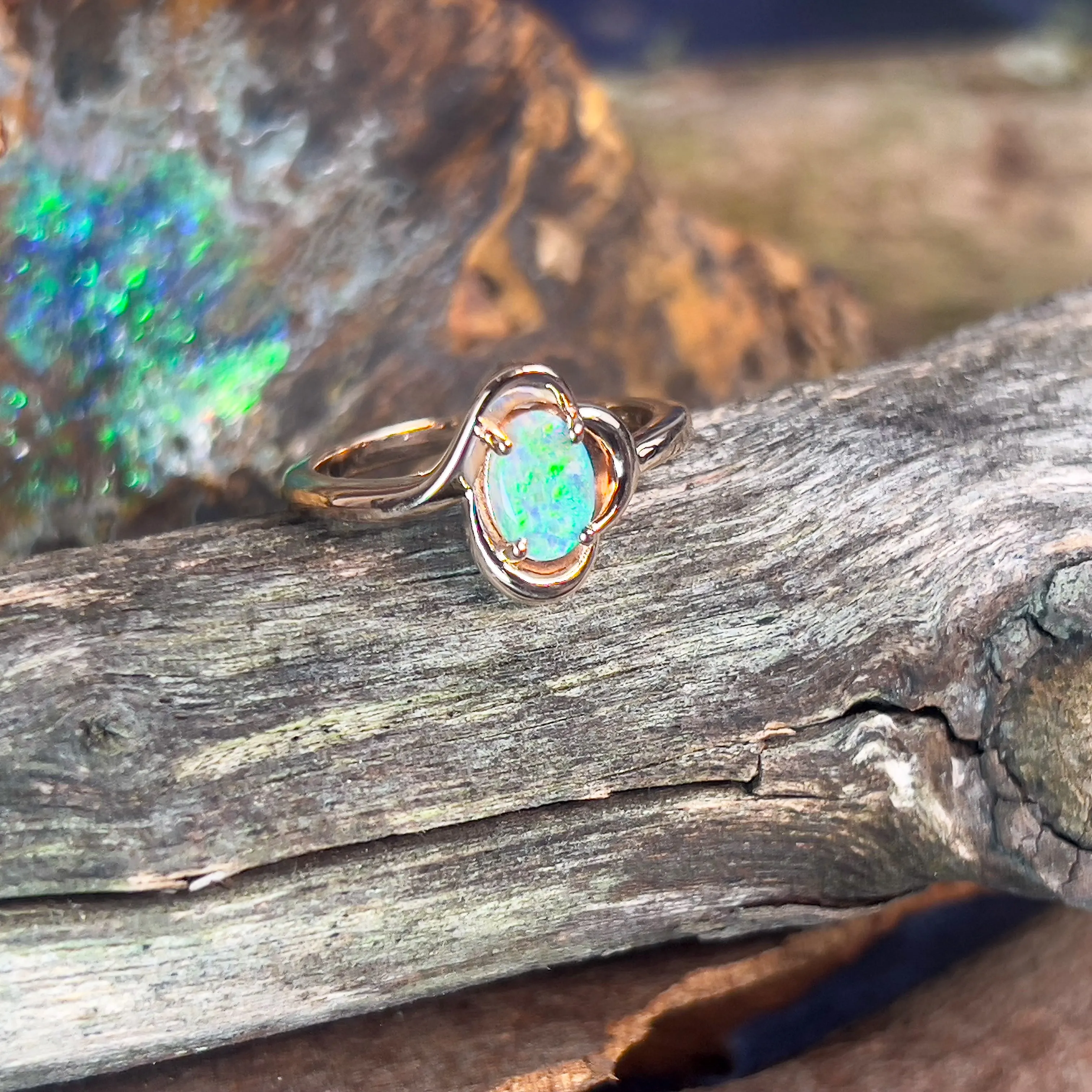 9kt Rose Gold solitaire ring with one Black Opal 0.47ct