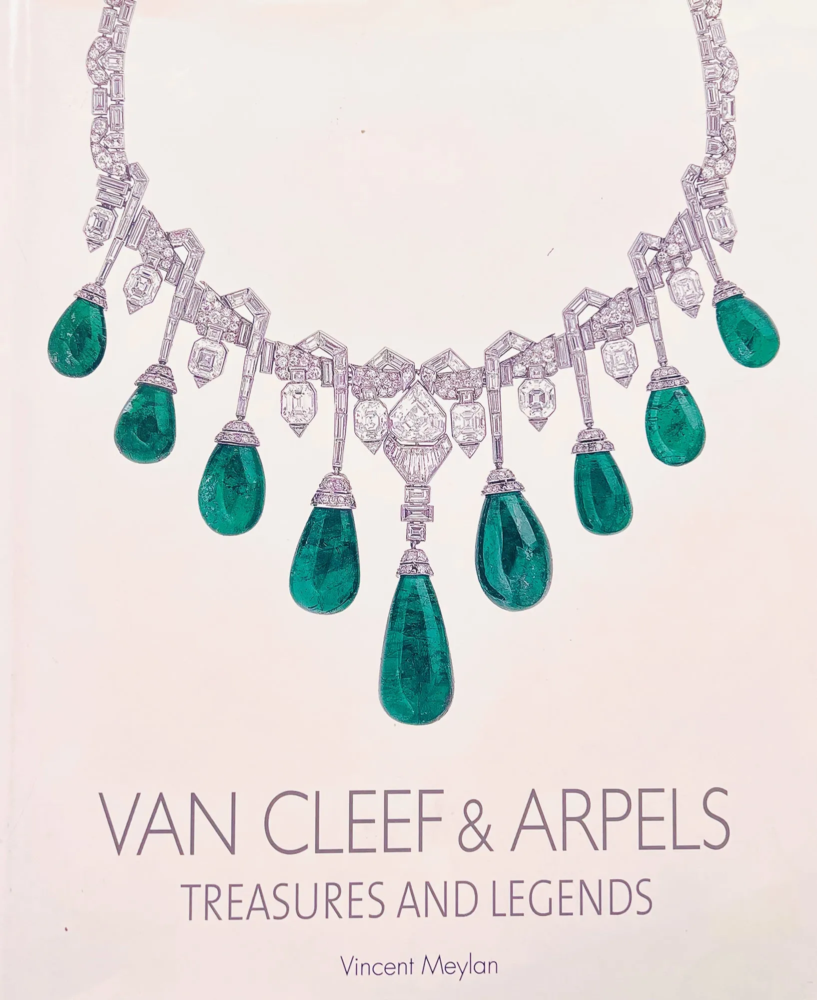 A yellow gold diamond and emerald Marguerite/Daisy Brooch. Van Cleef et Arpels, 1950 c.a.